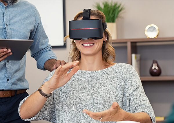 A learner trying a virtual reality headset